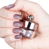 Nails featuring a smoky purple holographic powder with intense sparkle and multidimensional shine.